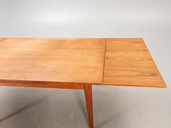 A Danish 1960s teak dining table.