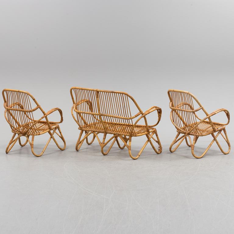 A second half of the 20th century sofa, table and armchairs.