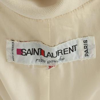 Yves Saint Laurent, YVES SAINT LAURENT, a creme colored wool blend coat.