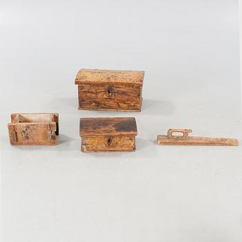 Four handicrrafted items from the 19th century.