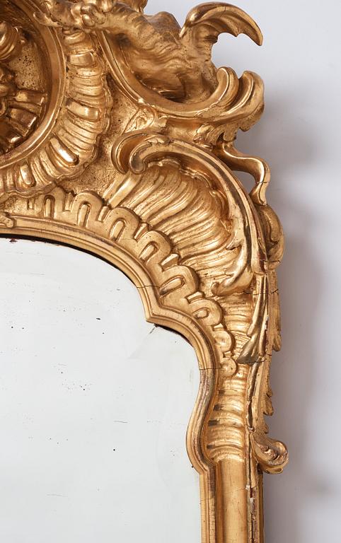 A Rococo dragon mirror.