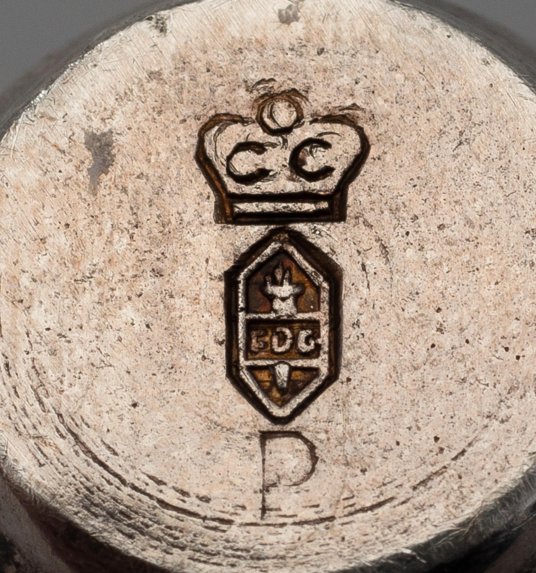 A pair of silver plated candelabra and a candelabrum, FDG, Denmark, mid 20th century.