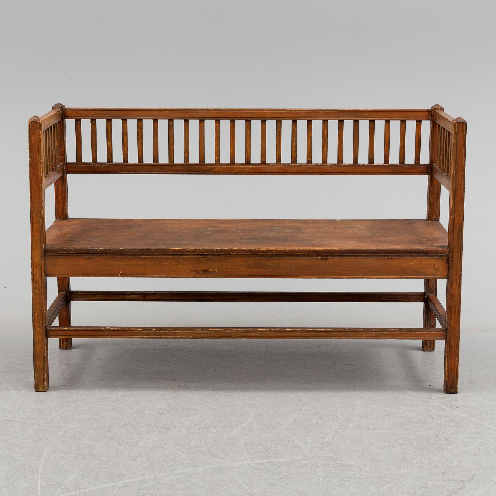 a wooden sofa from around 1900.