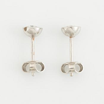 White gold and brilliant cut diamond earrings.