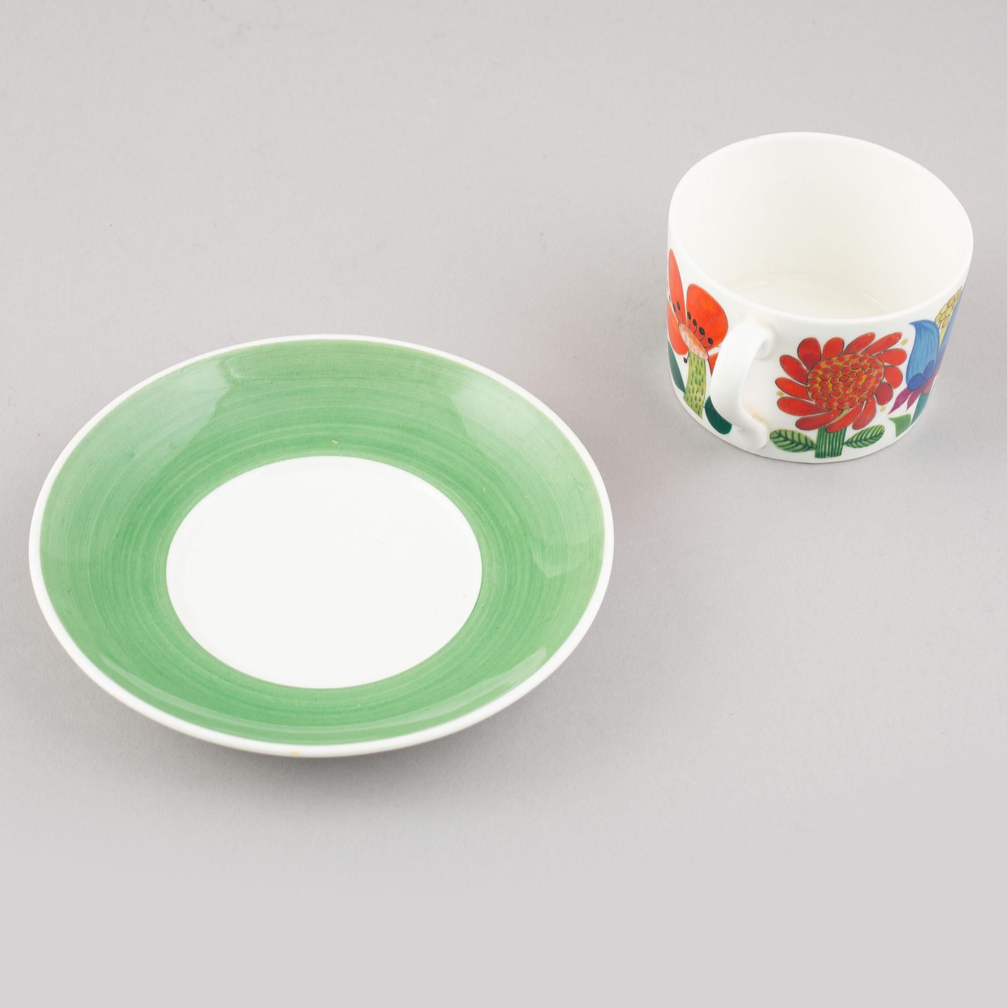 A set of four 'Tahiti' tea cups with plates by Stig Lindberg for Gustavsberg.