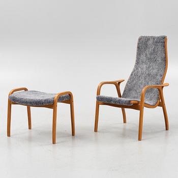 Yngve Ekström, a Lamino oak easy chair with footstool from Swedese, dated -06.