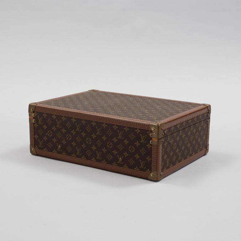 LOUIS VUITTON, a monogram canvas suitcase.