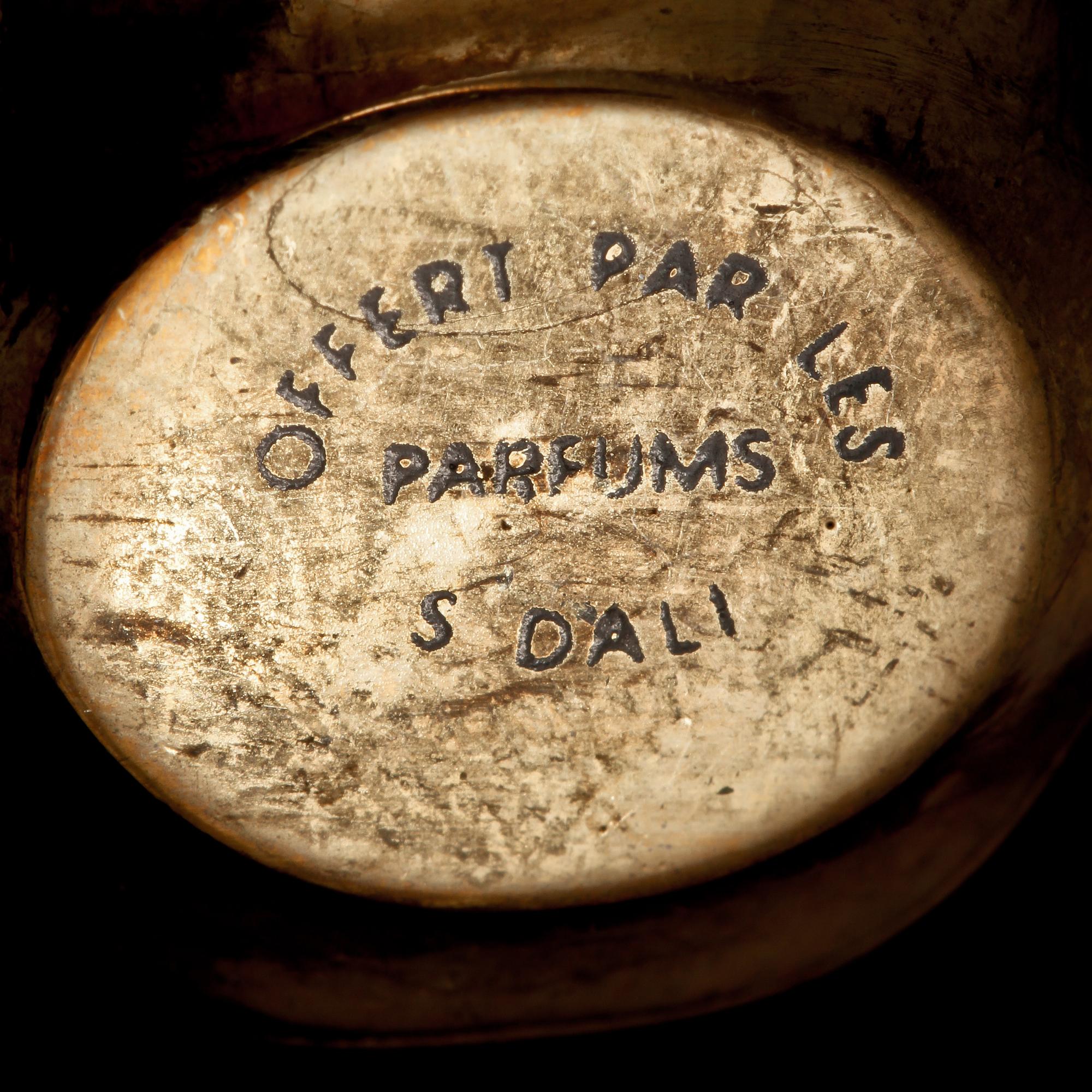 BERLOCKARMBAND, BROSCH SAMT HÄNGE, gulmetall, Salvador Dali, 1900-talets sista kvartal.