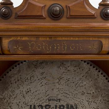 Polyphone with clock in walnut case, late 19th Century.