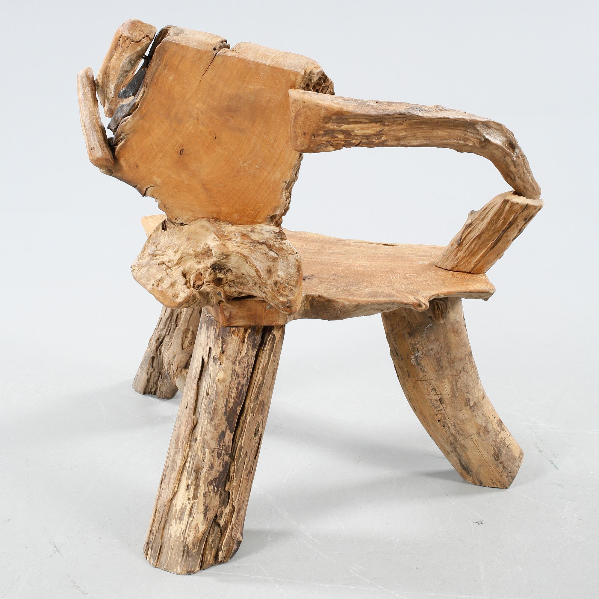 A wooden armchair, modern made.