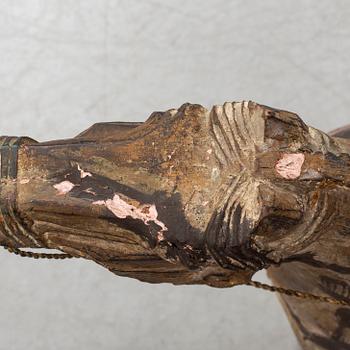 A large modern Chinese wooden sculpture.