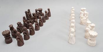 A SET OF  31 PLASTER AND WOODEN CHESSPIECES.