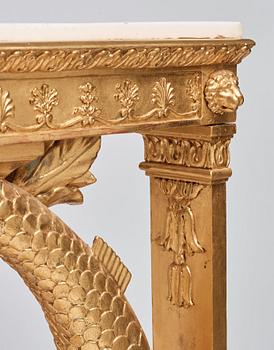 A pair of Swedish Empire carved and giltwood console tables, first half of the 19th century.