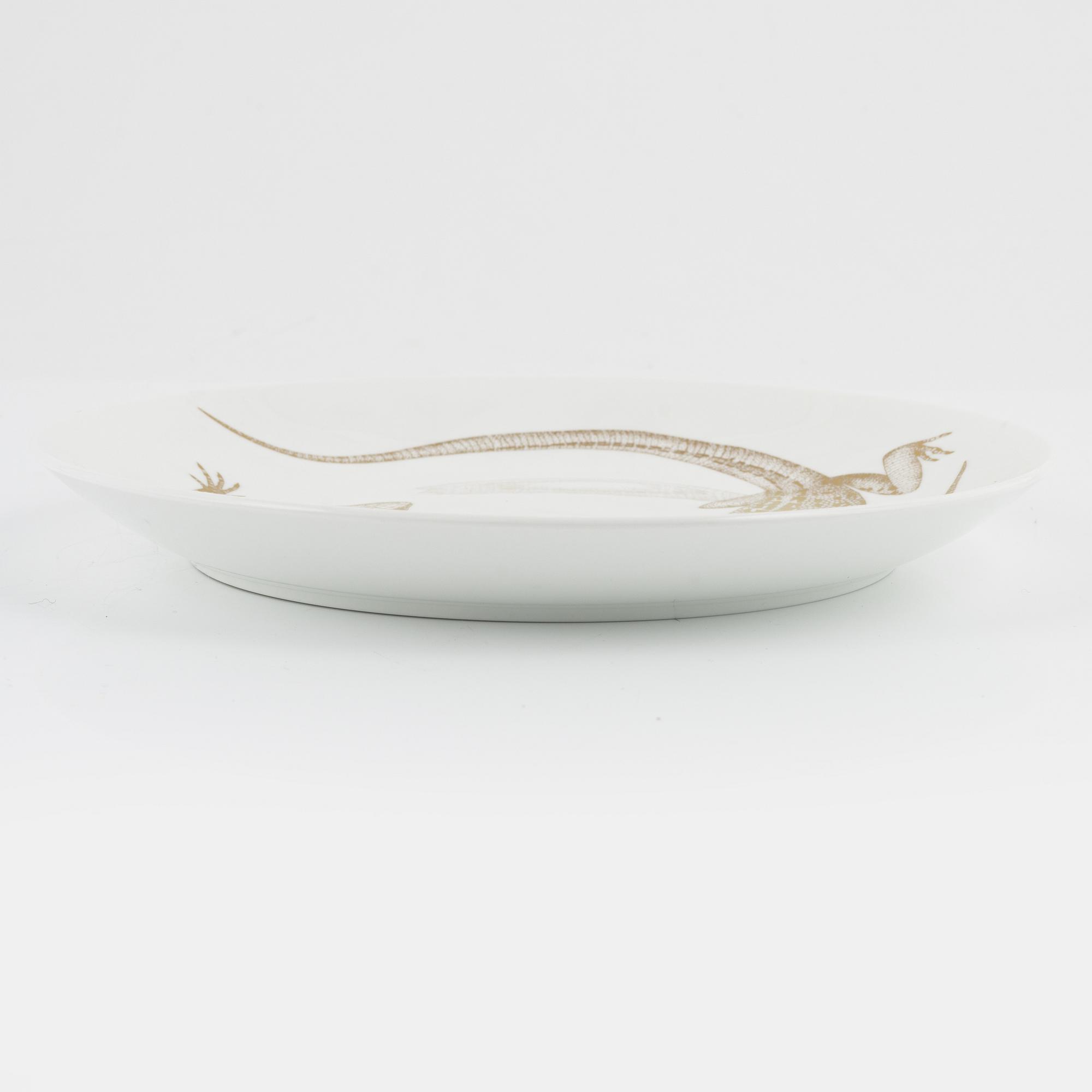 Paul Hoff, tallrikar, 22 st, porslin, "Arter i fara", Gustavsberg/Rörstrand.