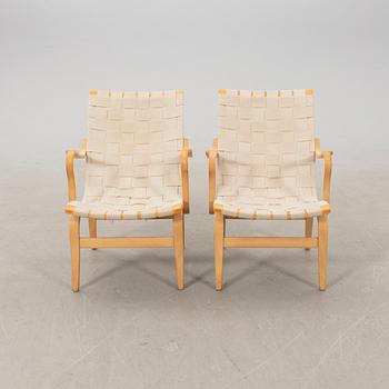 Bruno Mathsson, a pair of "Eva" armchairs for DUX, late 20th century.