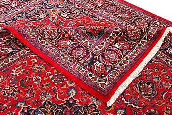 A Najafabad carpet, c. 351 X 305 cm.