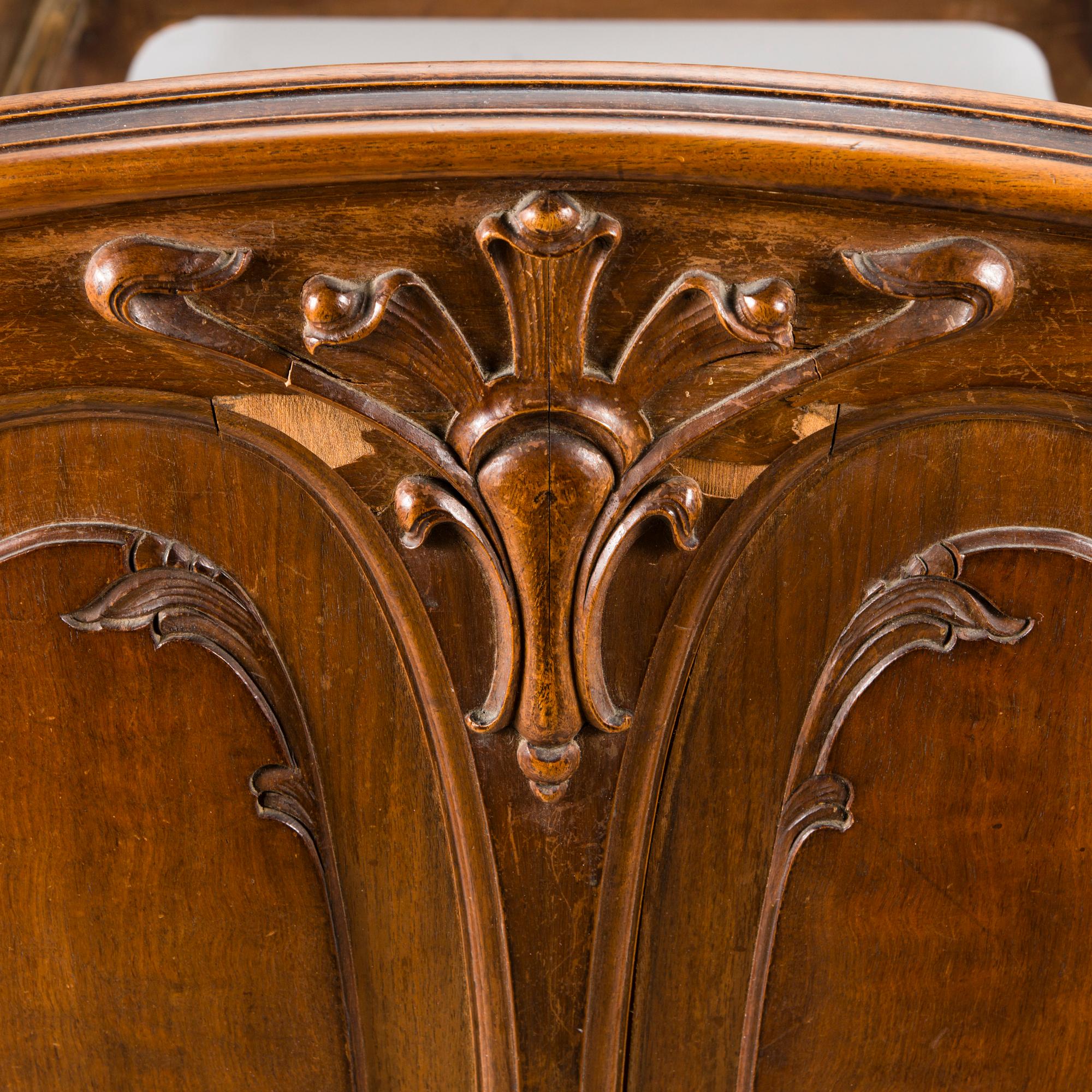A pair of early 20th Century art nouveau style beds.