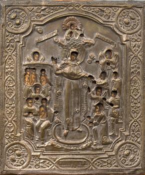 A late 190th century Russian tempera on board with brass rizza icon.