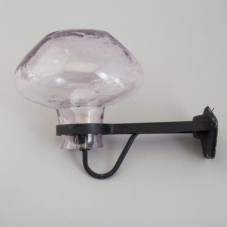 An ASEA iron and glass wall light, late 20th Century.
