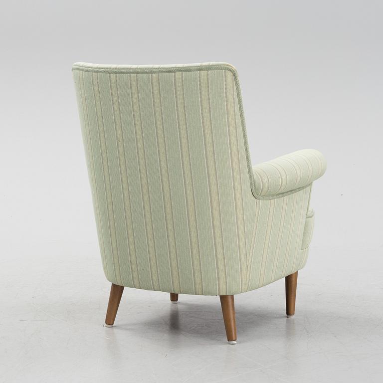 Carl Malmsten, a 'Hemmakväll' lounge chair from OH SJögren, later part of the 20th Century.