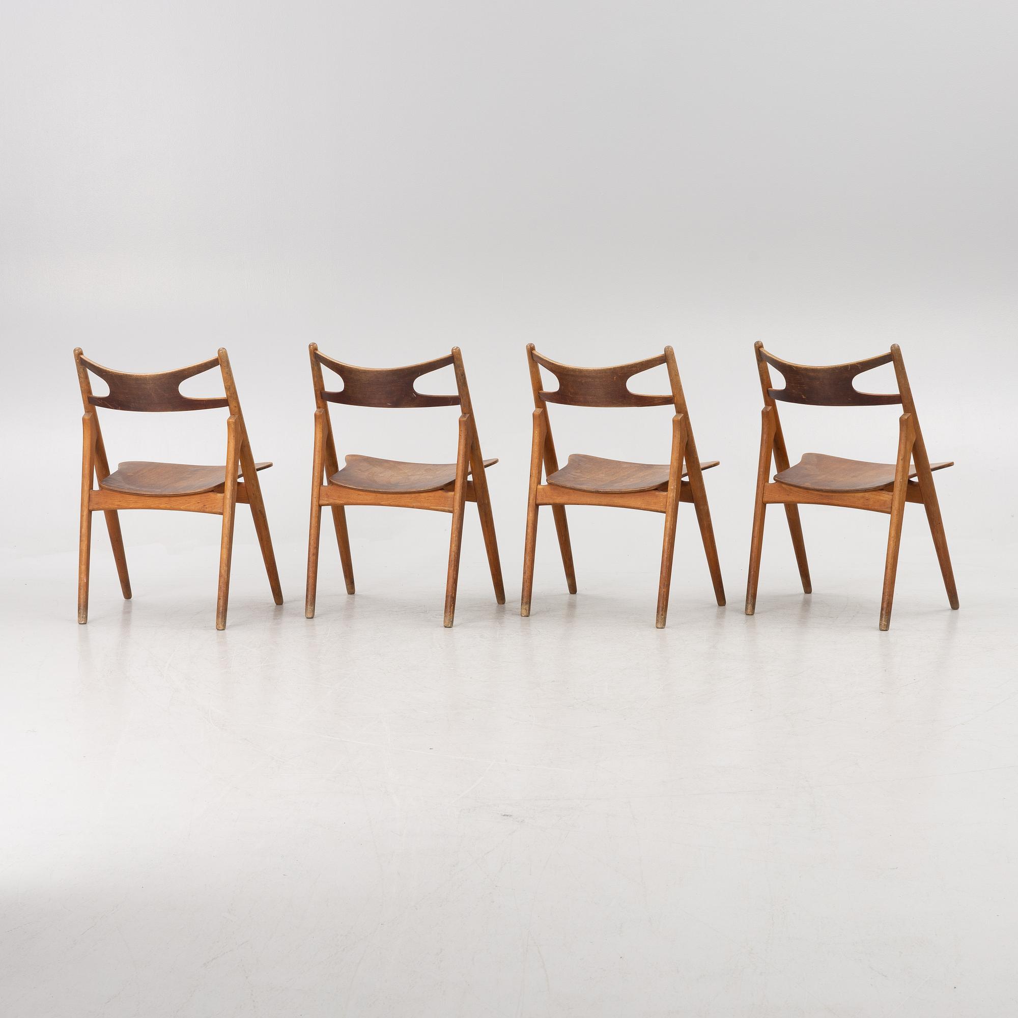 Hans J Wegner, four model CH 29 "The Savbuk Chair", Carl Hansen, 1960s.