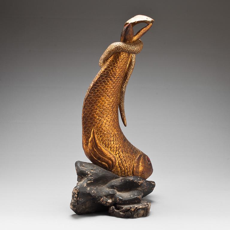SKULPTUR, skulpterat trä. Asien, 1900-tal.
