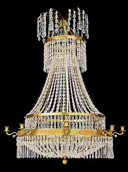 1435. A Swedish Empire 19th century nine-light chandelier.