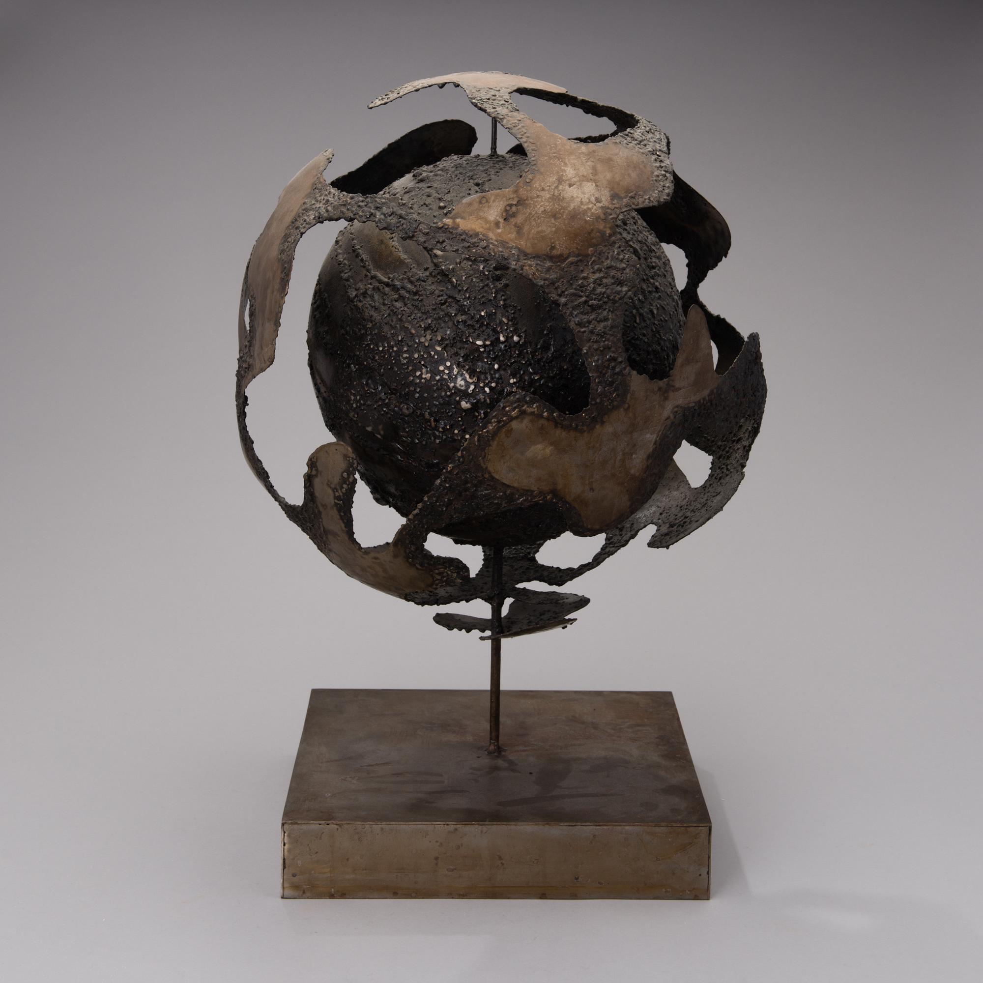 A bronze sculpture signed and dated 1969.