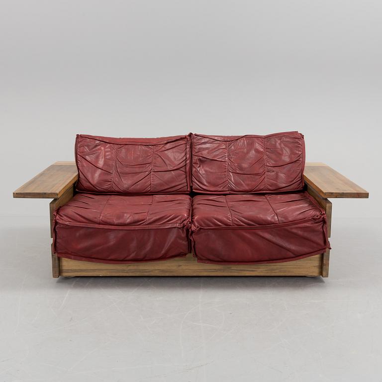 A Hämeen Kalustaja Finnish stained pine sofa, 1970's.