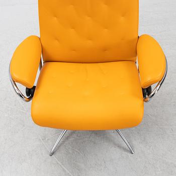 A 'London' stressless easy chair with foot stool, Norway.