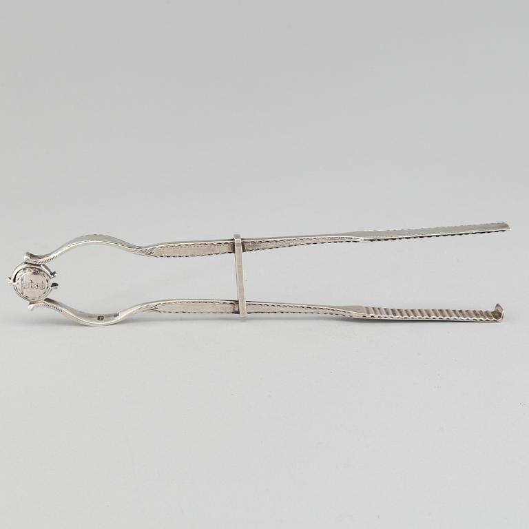 Silver asparagus tongs, England, probably London. Weight 144 grams.