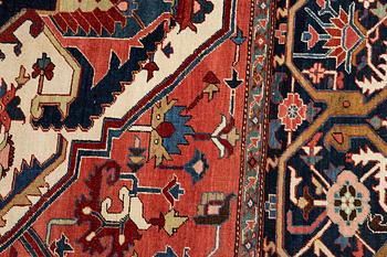 A carpet, antique Heriz, a so-called Serapi, ca 360 x 321 cm.