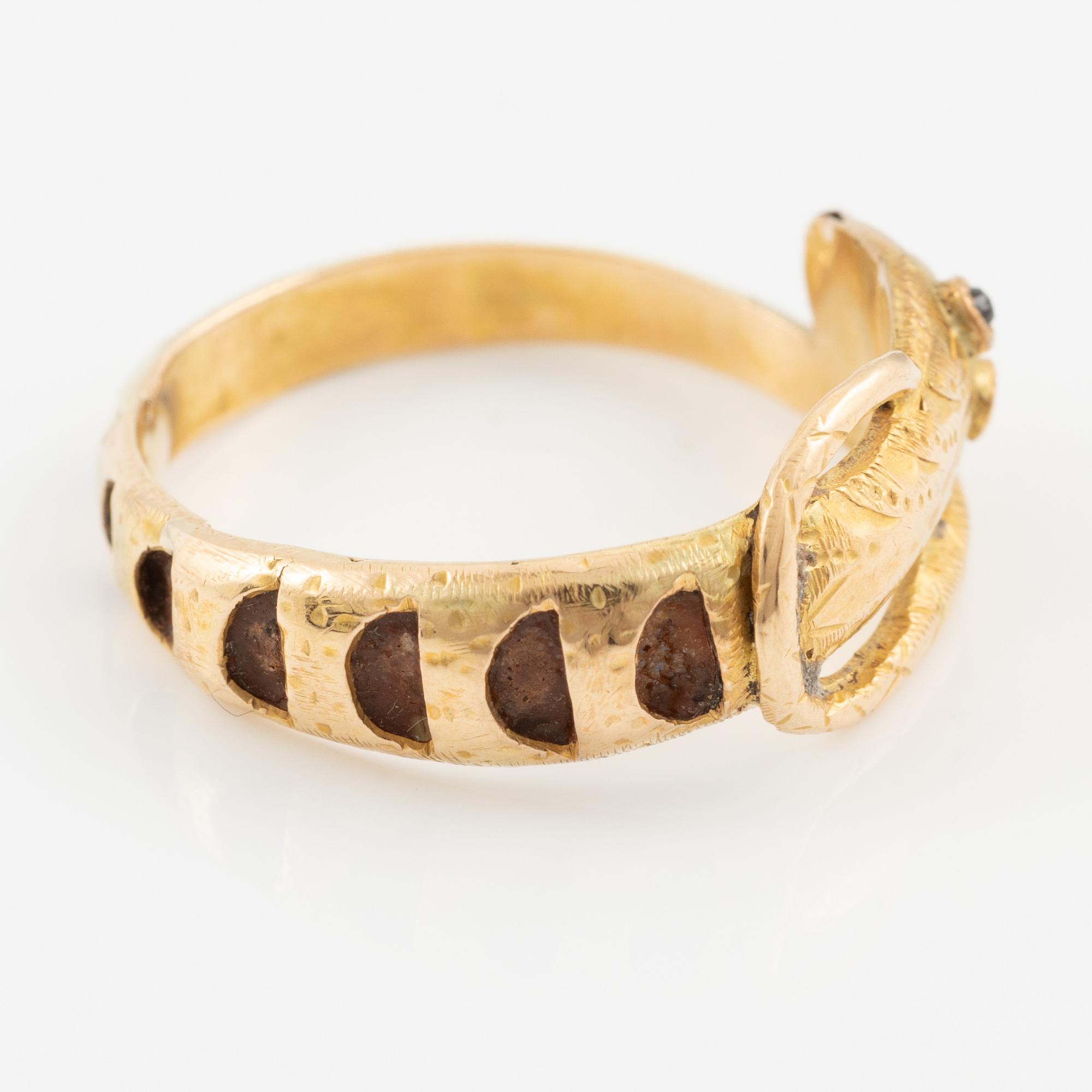 Ring, in the form of a serpent, 18K gold.
