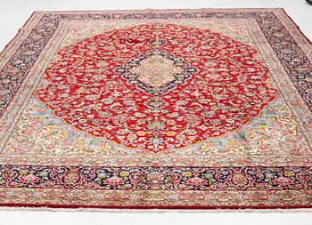 A carpet, semi-antique Kirman, signed, circa 400 x 300 cm.