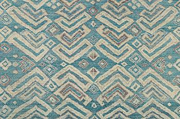 A Moroccan carpet, c. 398 x 200 cm.