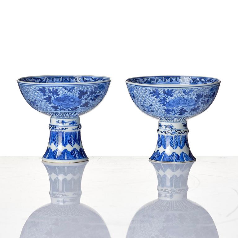 A pair of blue and white stemcups, Qing dynasty with Guangxu mark.