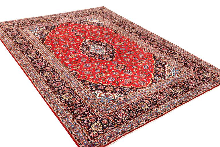 A Keshan carpet, c. 330 x 245 cm.