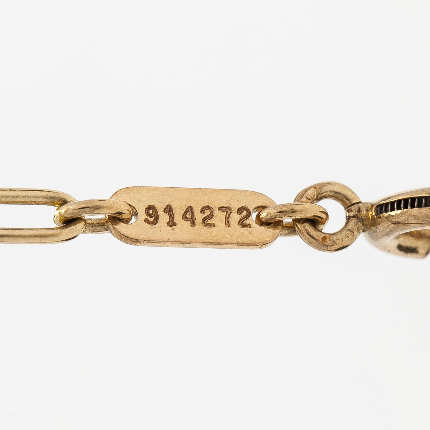 Cartier, kaulaketju riipuksella, risti "Trinity", 18K kolmiväri kulta.