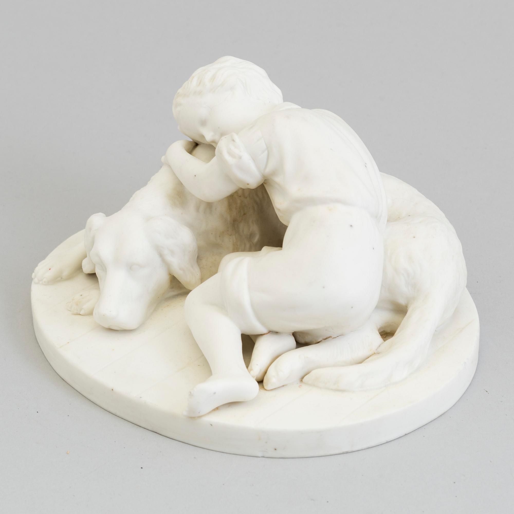 An early 20th century ceramic figurine with the mark AR.