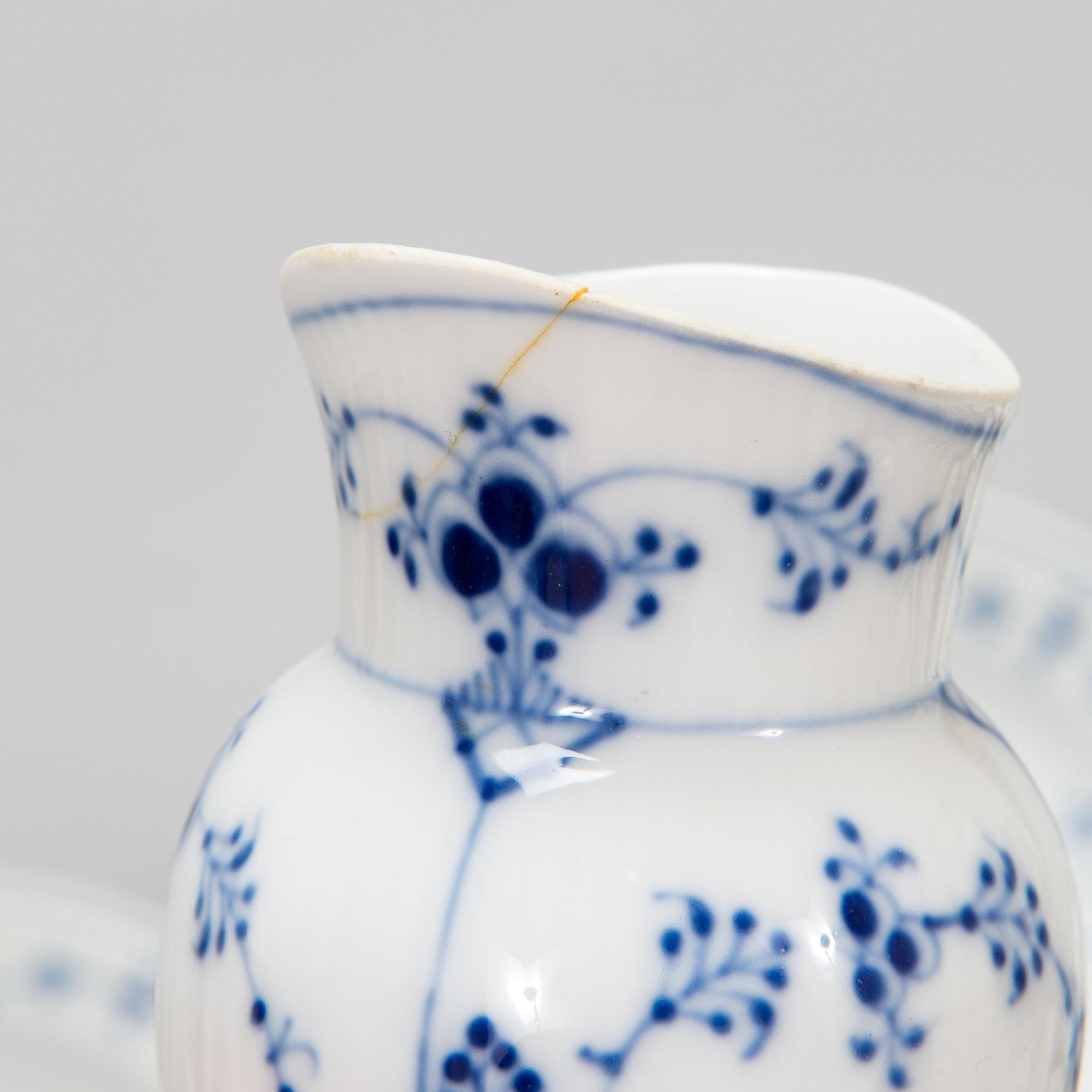 A 73-piece 'Blue Fluted Plain' porcelain tableware set, Copenhagen, Denmark, mostly 1940s-60s.