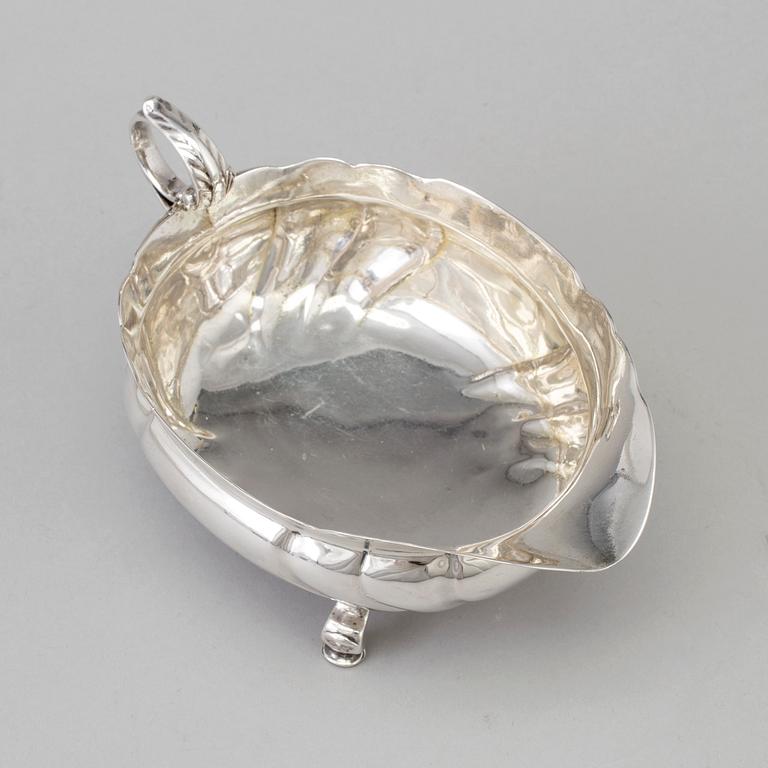 A Swedish mid 18th century silver cream-jug, marks of Kilian Kelson, Stockholm 1753.