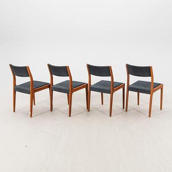 A set of four 1960s teak chairs.
