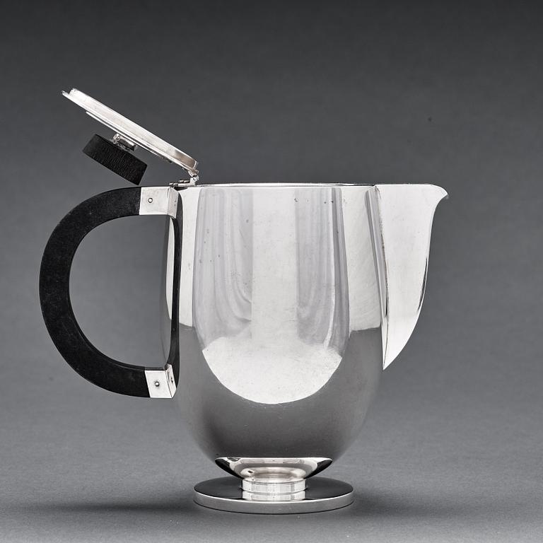 Guttorm Kristiansen (Gagnes), a four pieces 830/1000 silver tea- and coffee service, David-Andersen, Norway 1927-49.