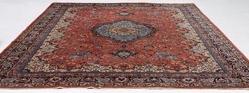 An oriental carpet, c. 370 x 275 cm.