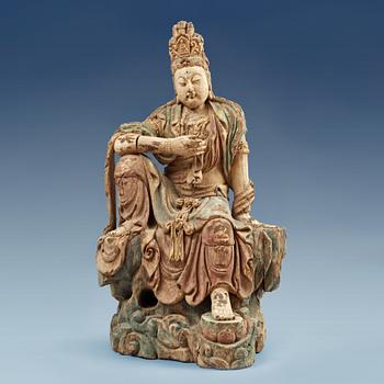 A wooden figure of Guanyin, presumably Ming dynasty (1644-1912).