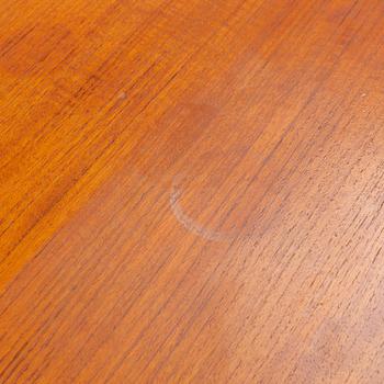A teak veneer and stained beech dining table, mid 20th Century.