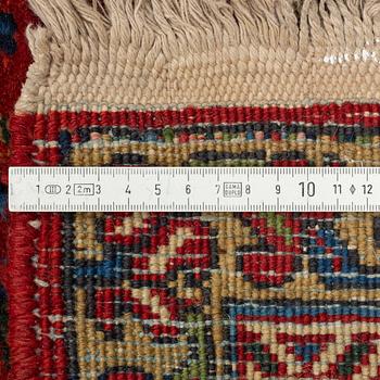 A semiantique carpet, noth western Persia, presumably Heriz, ca 381 x 308 cm.