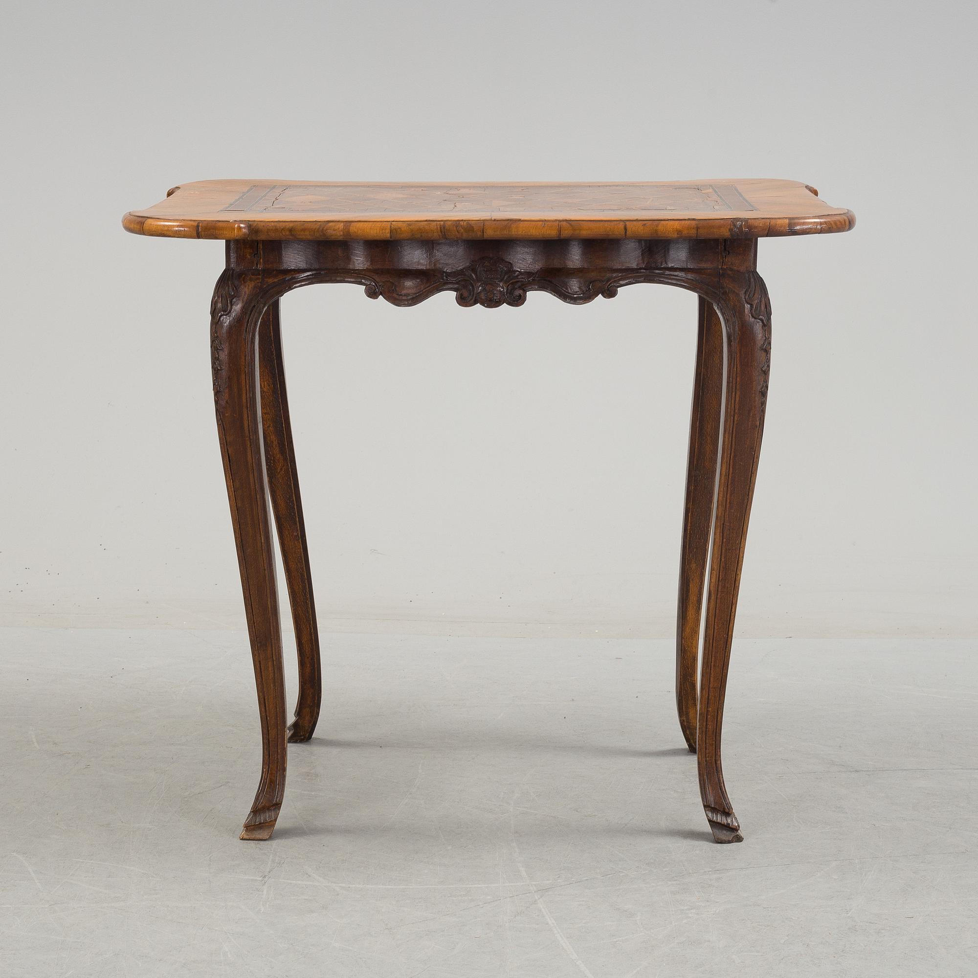 A mid 18th century rococo table.