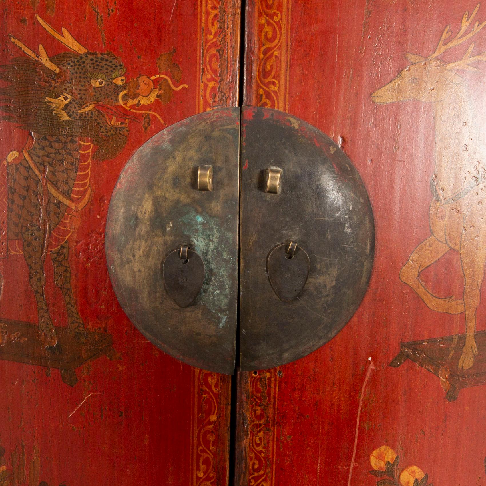 A 20th century Chinese painted wooden cabinet.