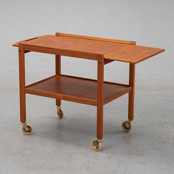 a mid 20th century teak serving trolley.